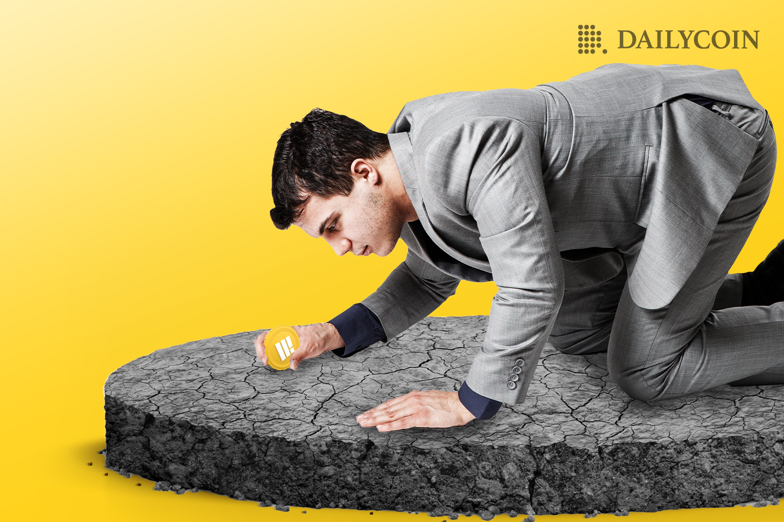 A man kneeling down down to pick up a really small BUSD coin