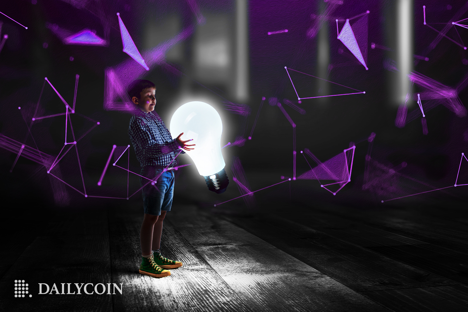 A boy holding a huge bulb
