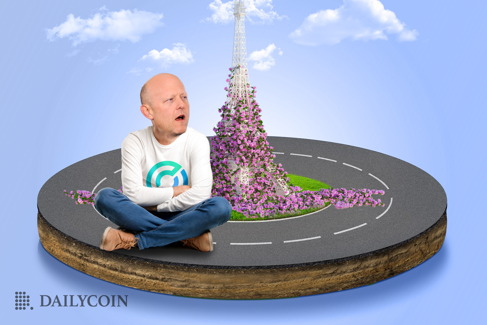 Jeremy Allaire sitting cross-legged near the Eiffel Tower that's covered flowers.