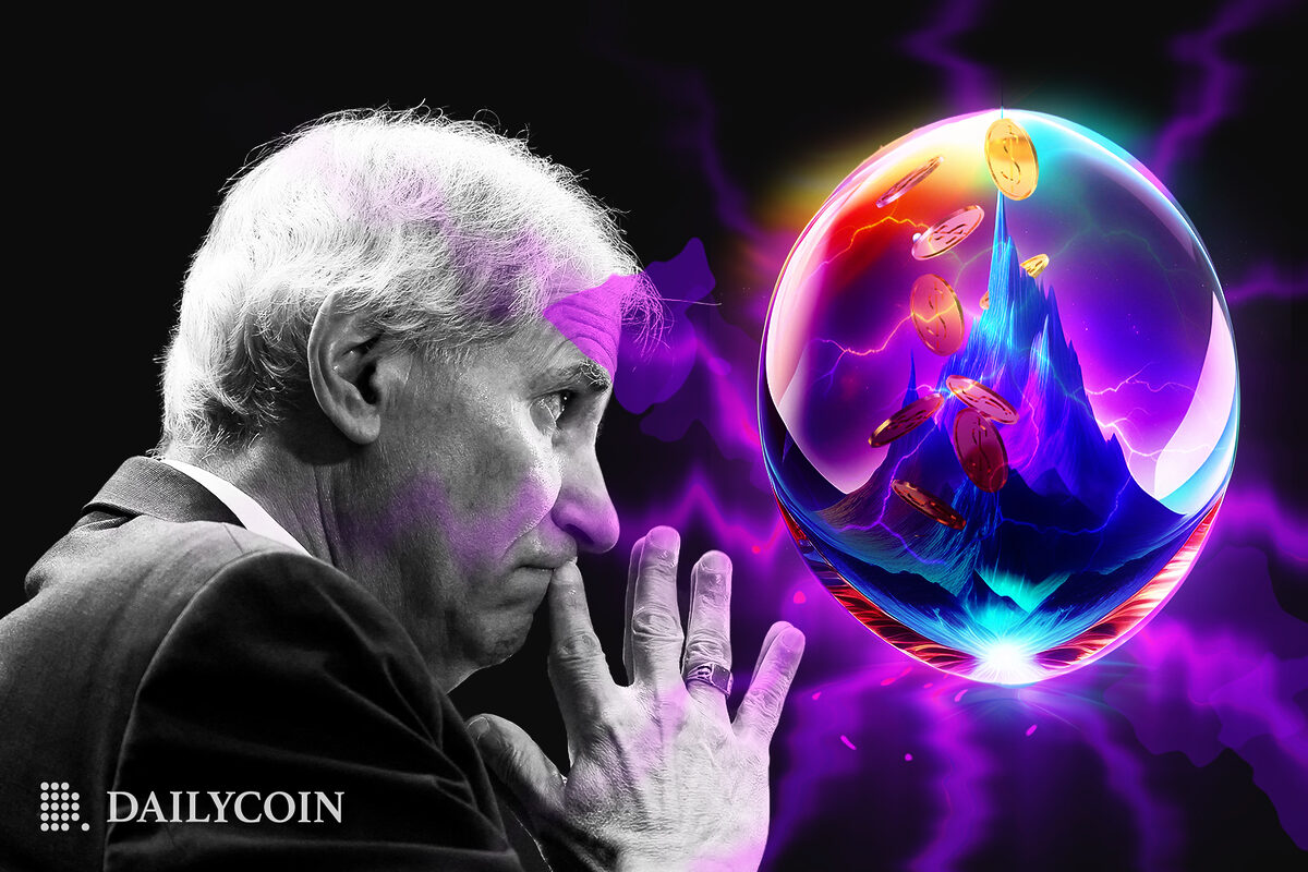 Martin J. Gruenberg looking at an orb with tall mountain inside.