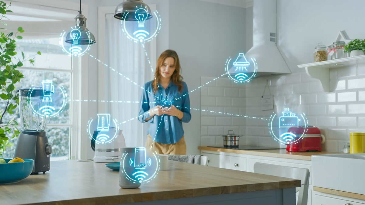 woman connects her phone to smart home applications