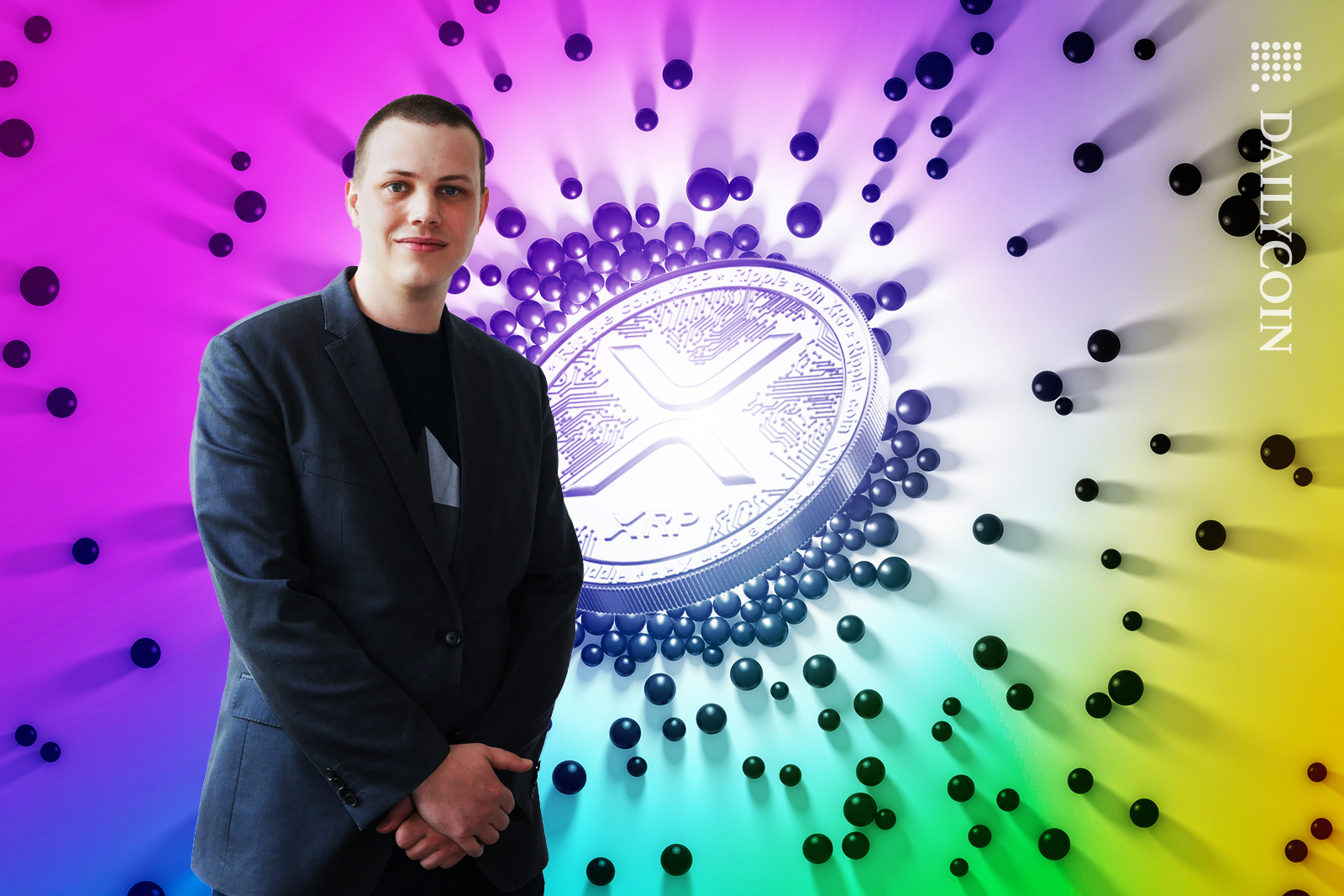 Justin Bons standing forward and smiling in front of XRP coin beaming with bubbles.