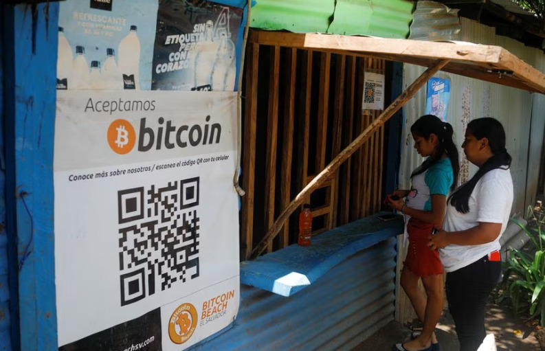 Two woman purchase goods with BTC.