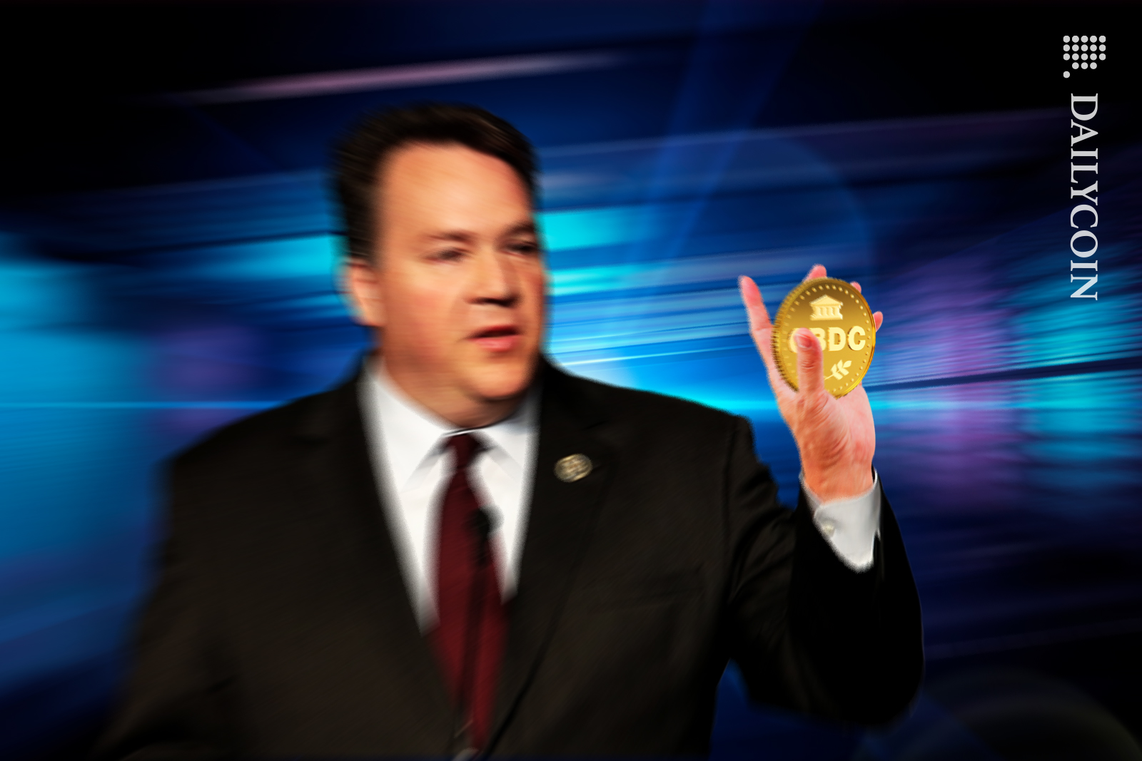 Congressman Alex Mooney holding a CBDC in a paused blur.