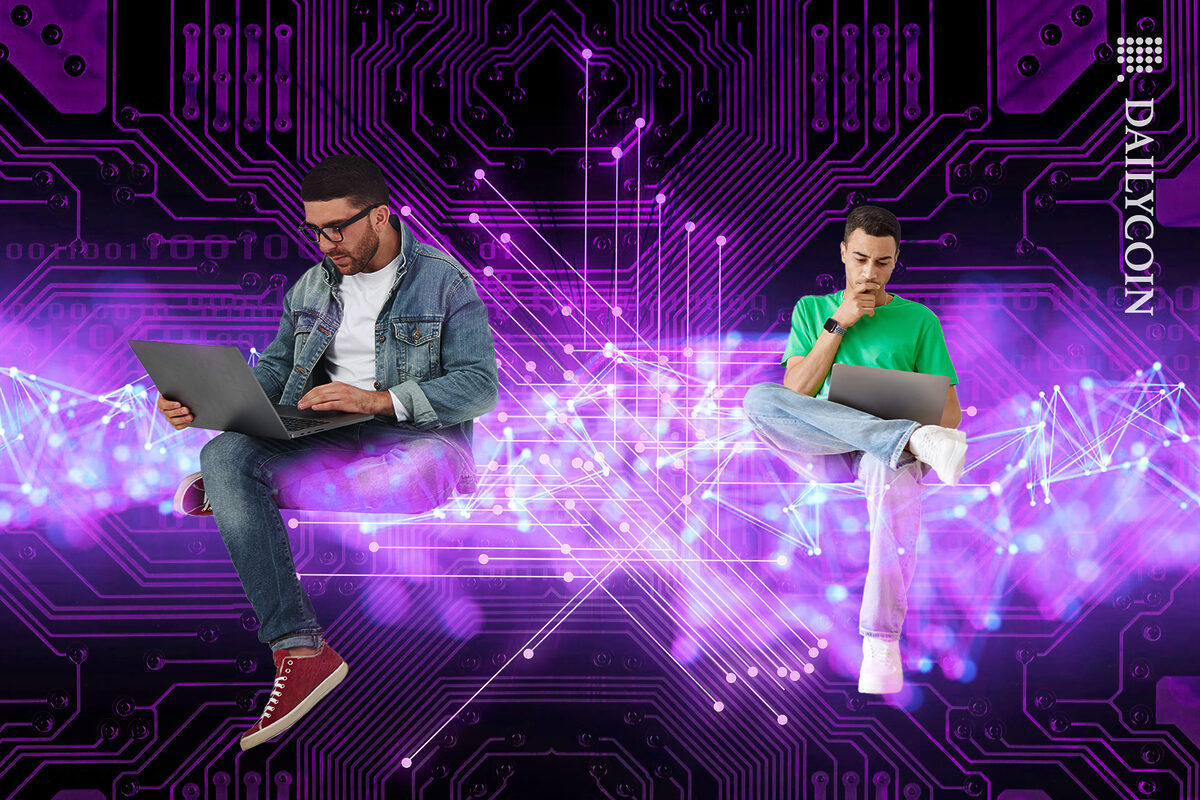 Men working on laptops on blockchain.