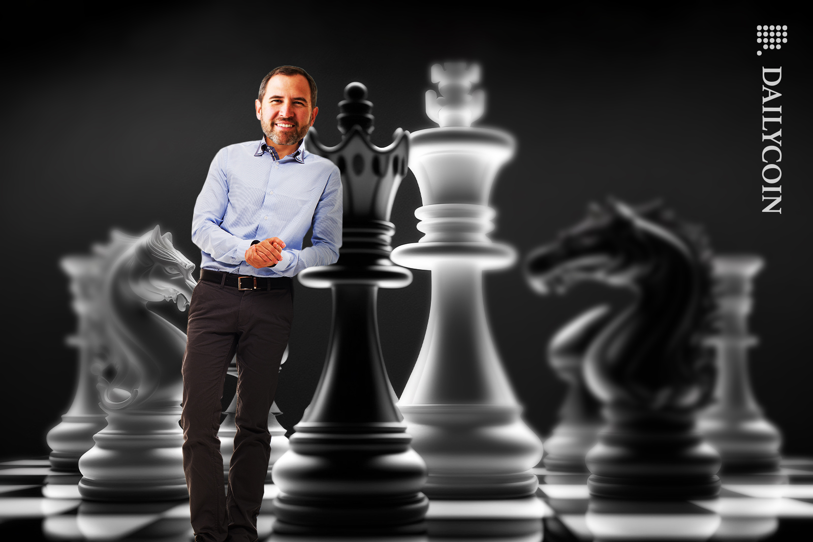 Brad Garlinghouse leaning on a chess peace smilling.