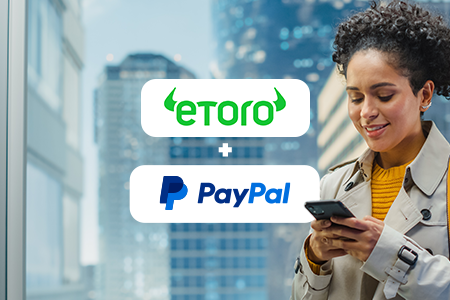eToro and PayPal promo graphic.
