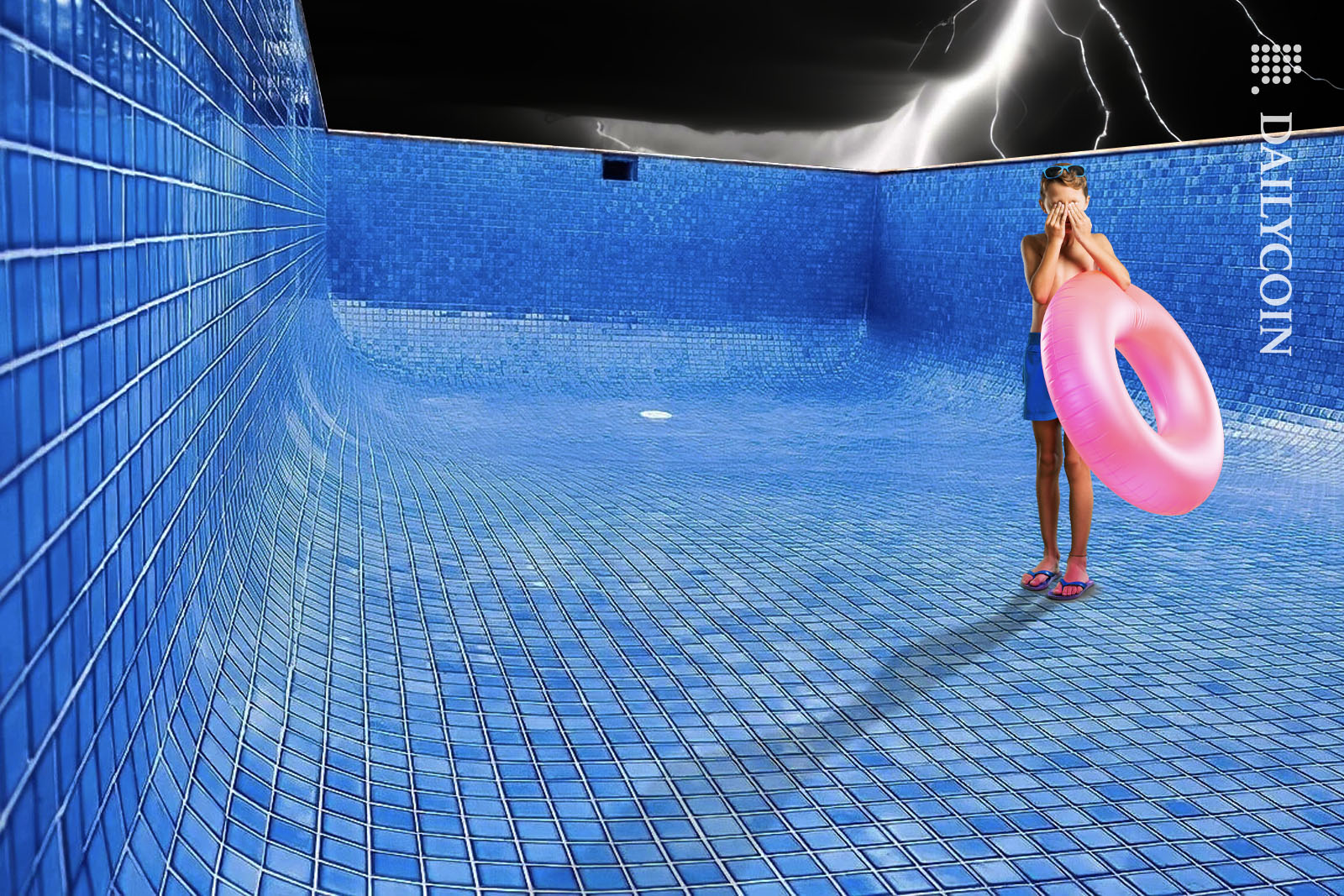 Kid in an empty pool being very disappointed.