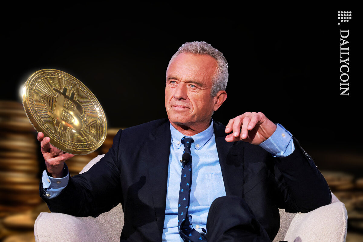 Robert F. Kennedy Jr. holding a Bitcoin.