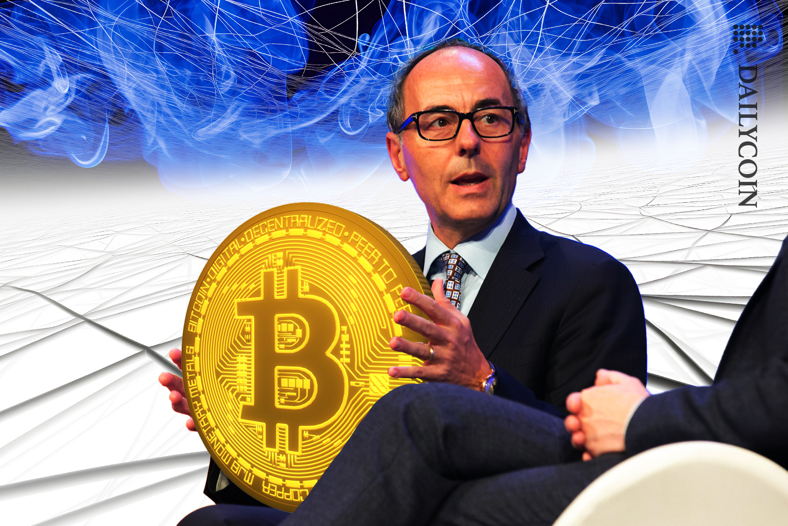 VanEck CEO Jan van Eck holding a massive Bitcoin.