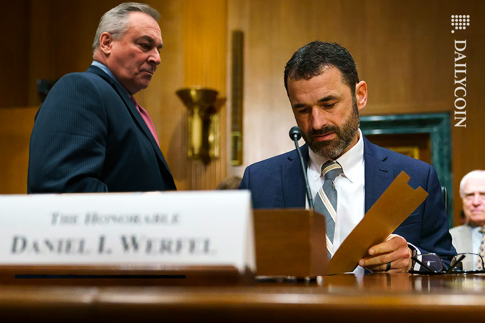FTX CEO John Ray iii in court with Daniel Werfel. Daniel is opening a empty tax box dissapointed.