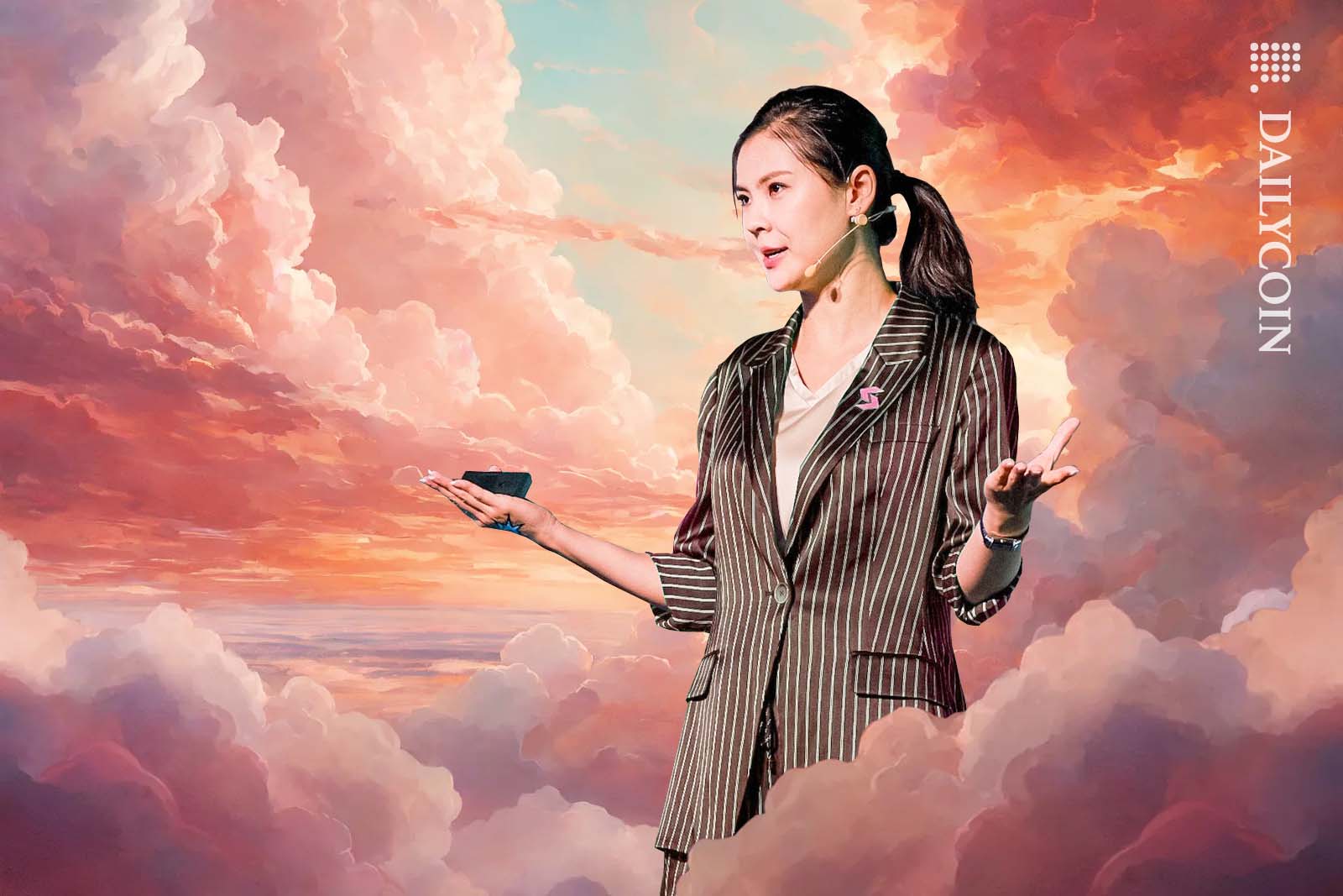 Gracy Chen giving a speech surrounded by heavenly pink clouds.
