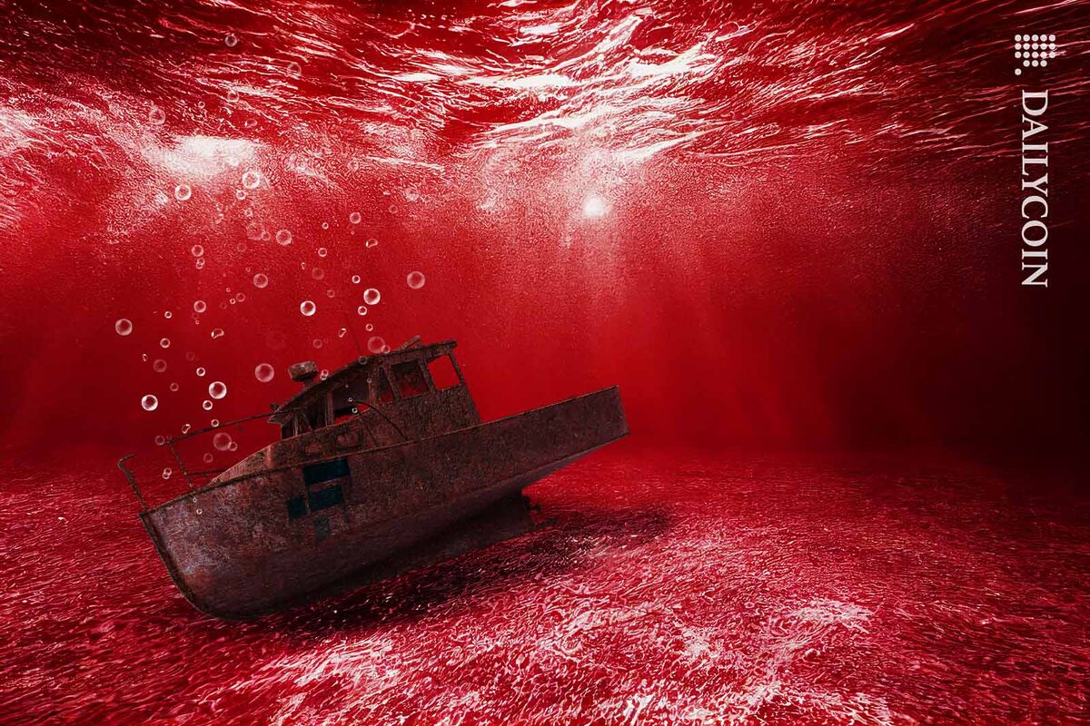 Old rusty boat resting on the bottom of the sea.