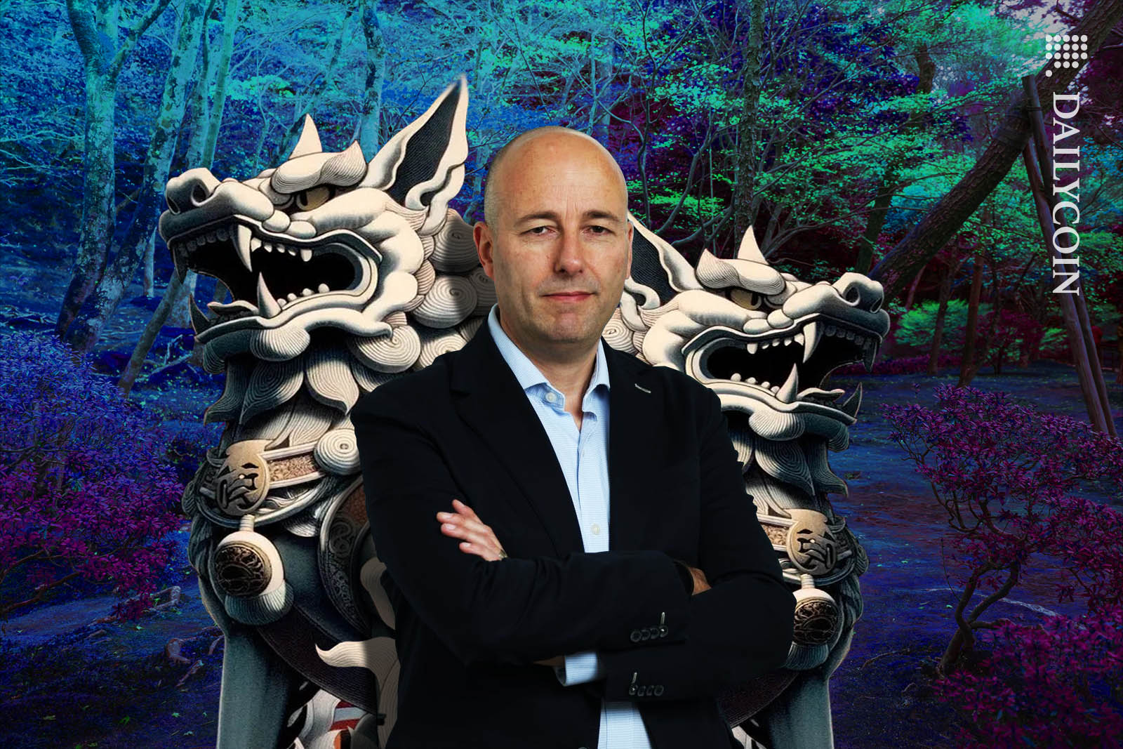 Nicolas Bertrand posing onfront of two Komainu statues.