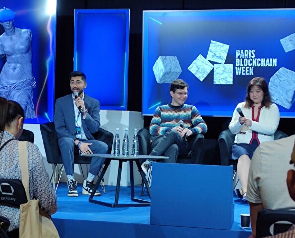 Presenters having a discussion at Paris Blockchain Week.