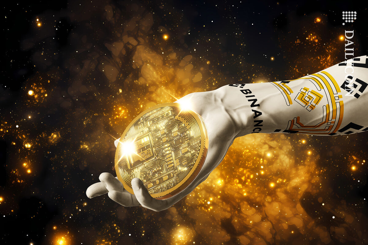 Binance hand offering a gold shiny crypto coin.