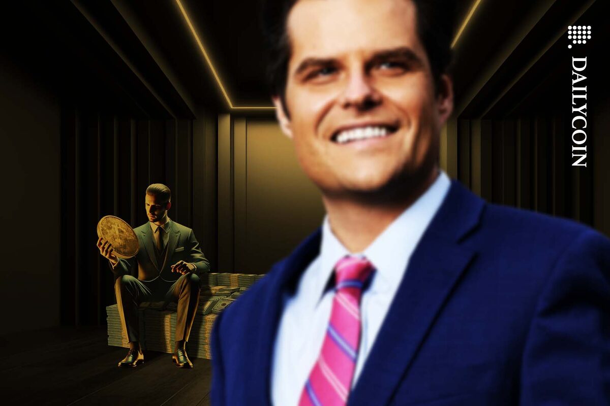 Tax man in suit examining a Bitcoin, with Congressman Matt Getz in the foreground.