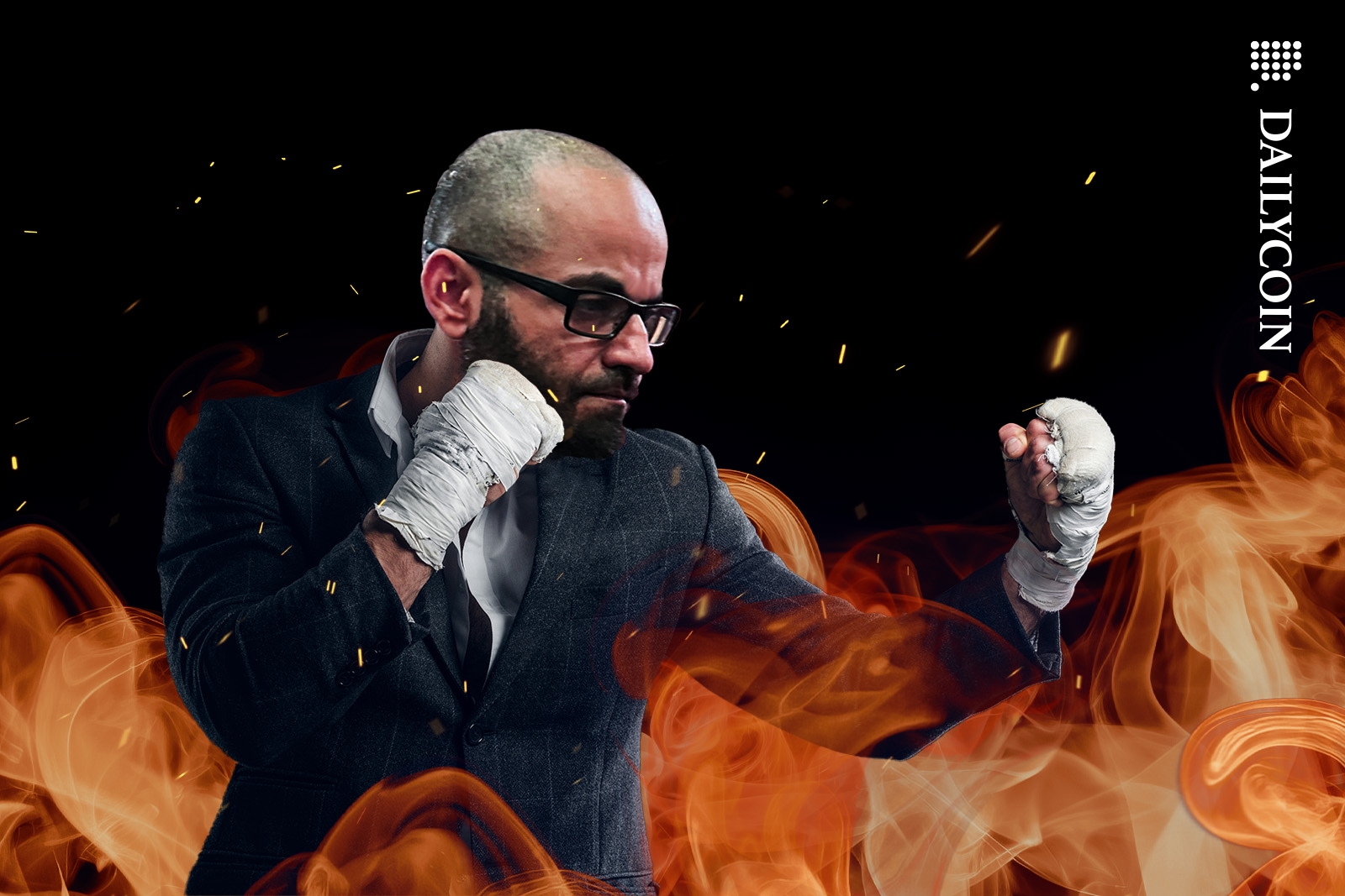 Tigran Gambaryan ready for a fight in a defensive position surrounded by flames.