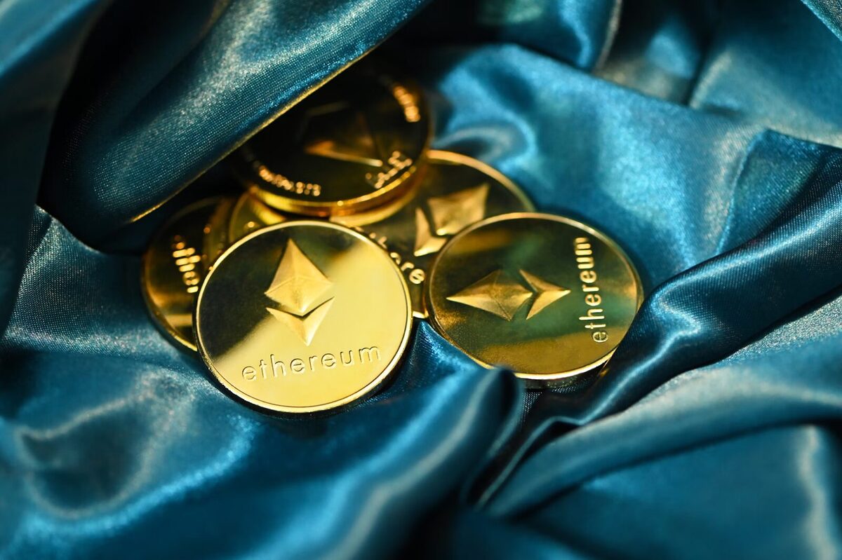 Some Ethereum tokens on a nice piece of blue cloth.