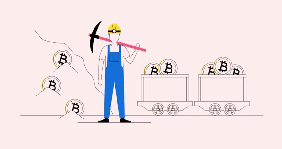 A crypto miner holding a pickaxe next to a trolley full of mined BTC.