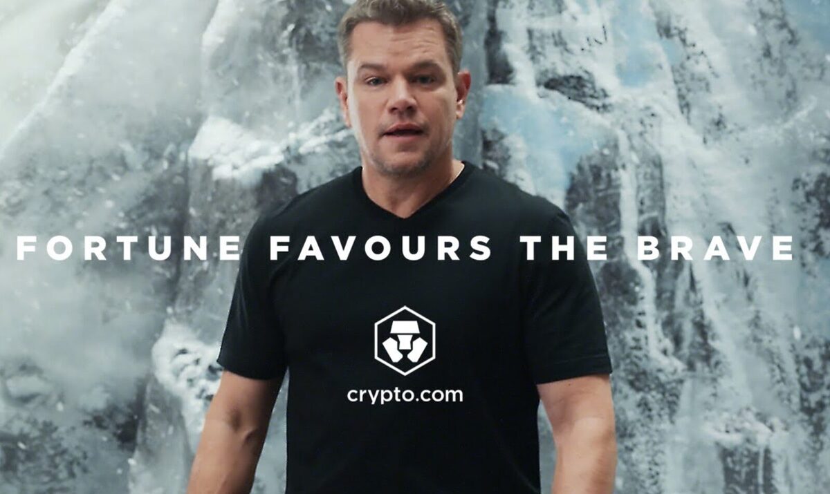 Matt Damon standing in front of a large icicle with the tagline "Fortune Favours The Brave" as part of a Crypto.com advertisement.