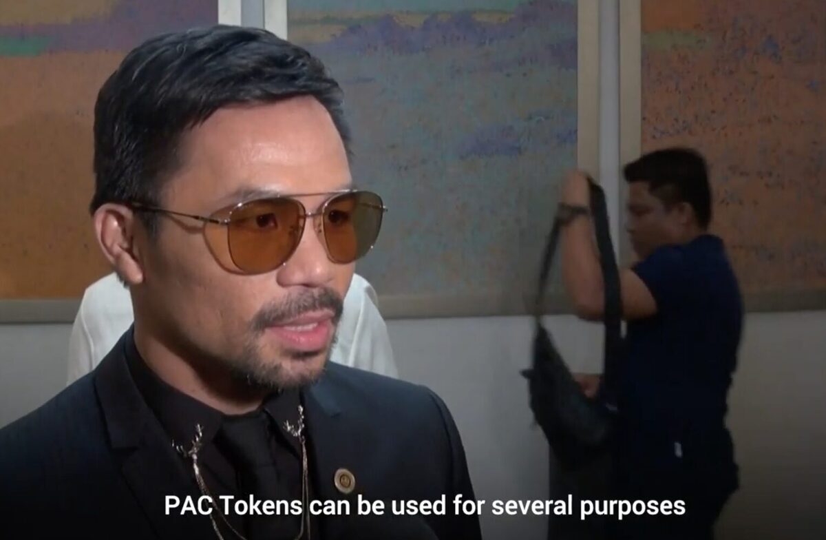 Boxer Manny Pacquiao speaking to a reporter and saying "PAC Tokens can be used for several purposes."