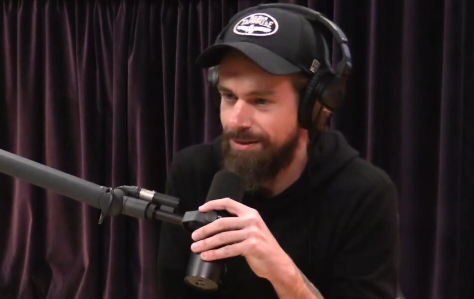 Jack Dorsey, former CEO of Twitter, sitting in Joe's podcast studio with a mic in front of him.