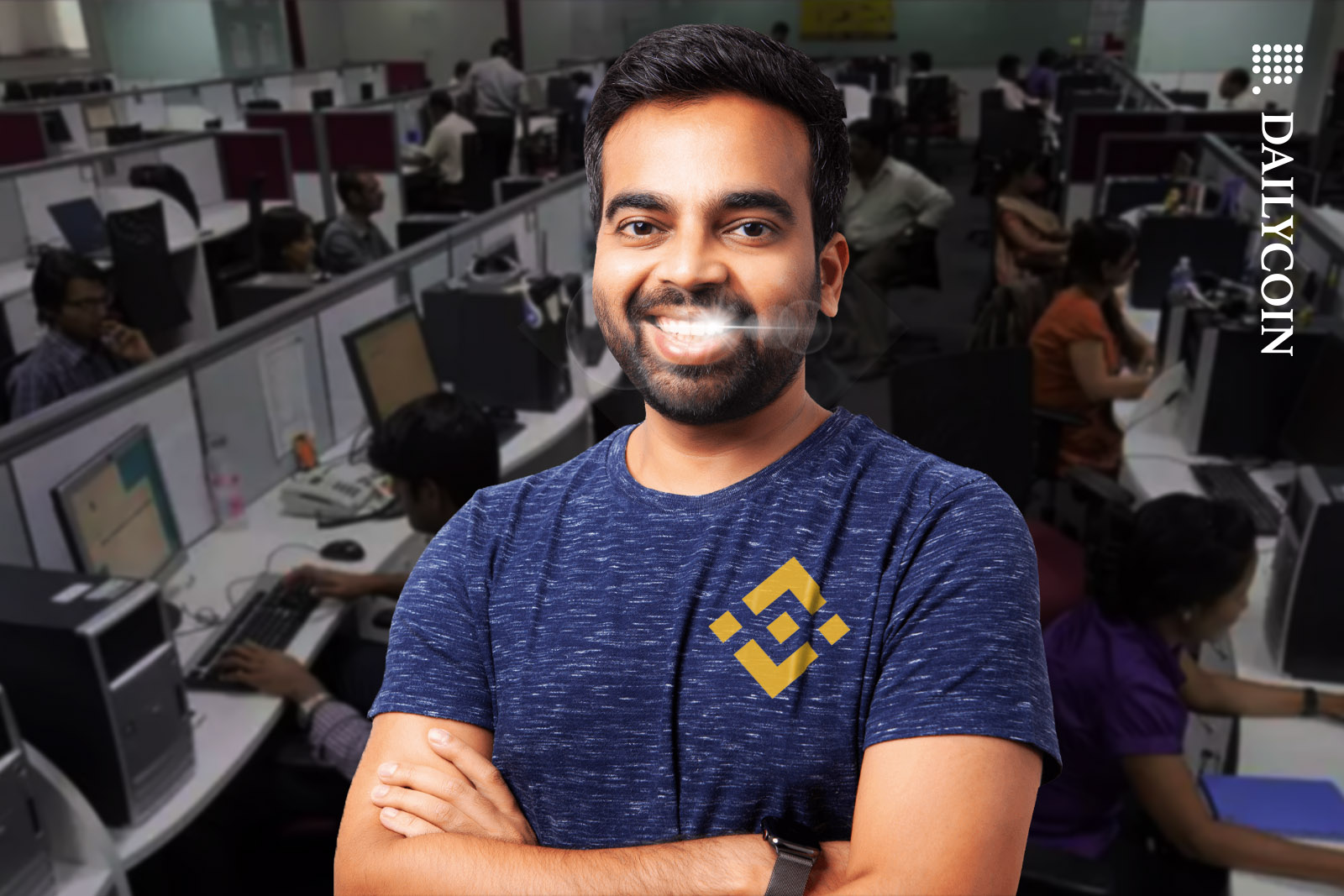 Nischal Shetty os WazirX posing in a Binance T-shirt.