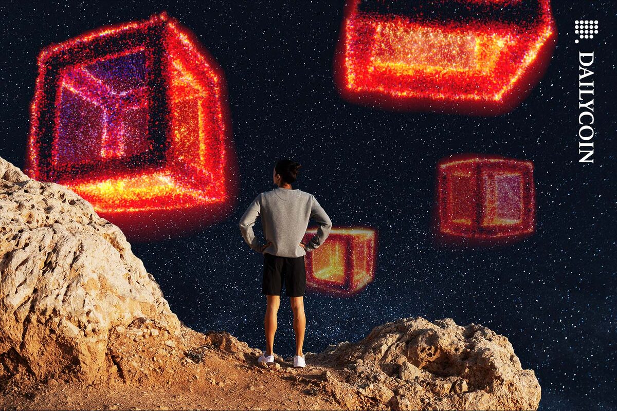 Man staring at some fiery cubes levitating on the night sky.