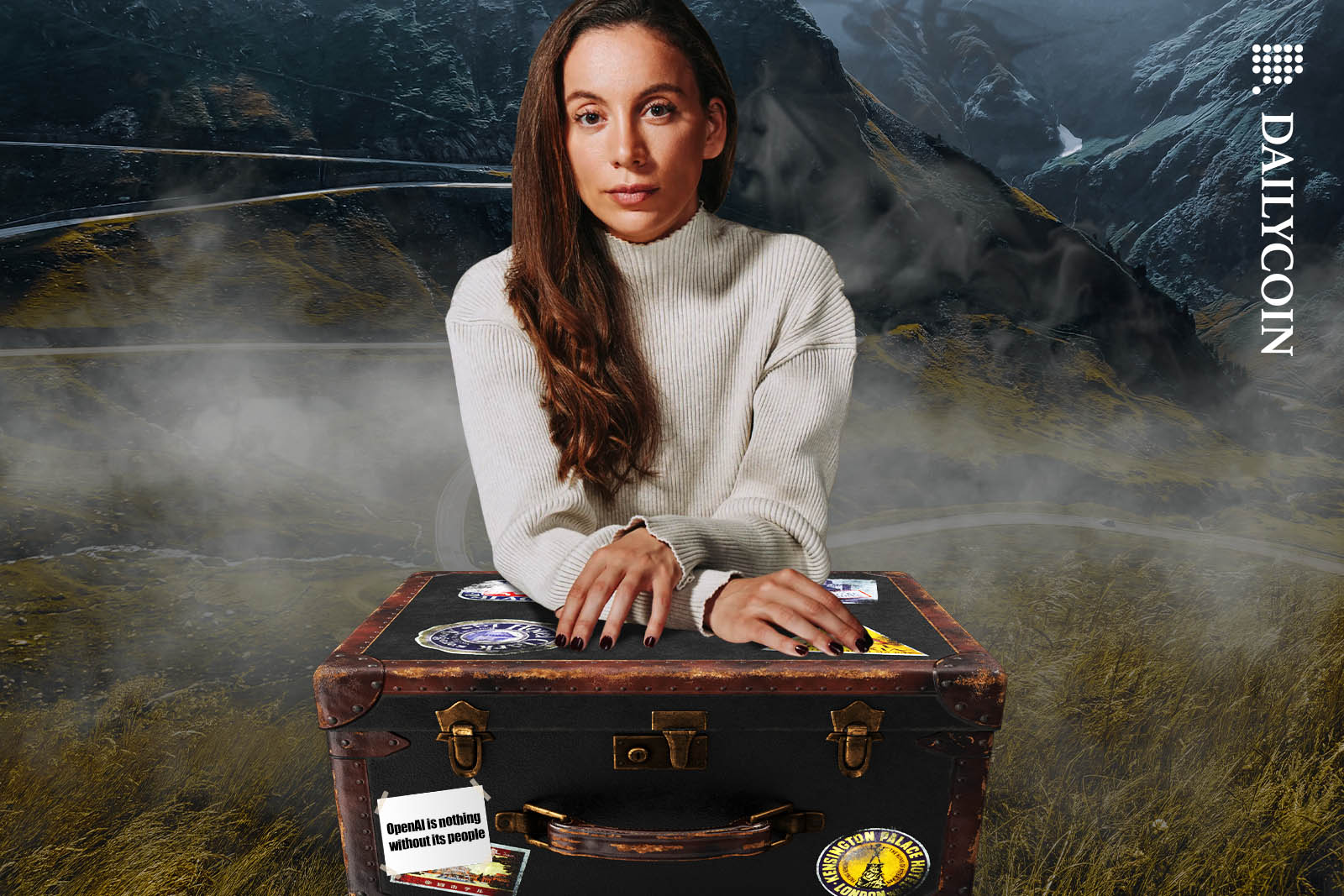 Mira Murati resting on an old fashioned travel trunk in front of a scenic mountain road.