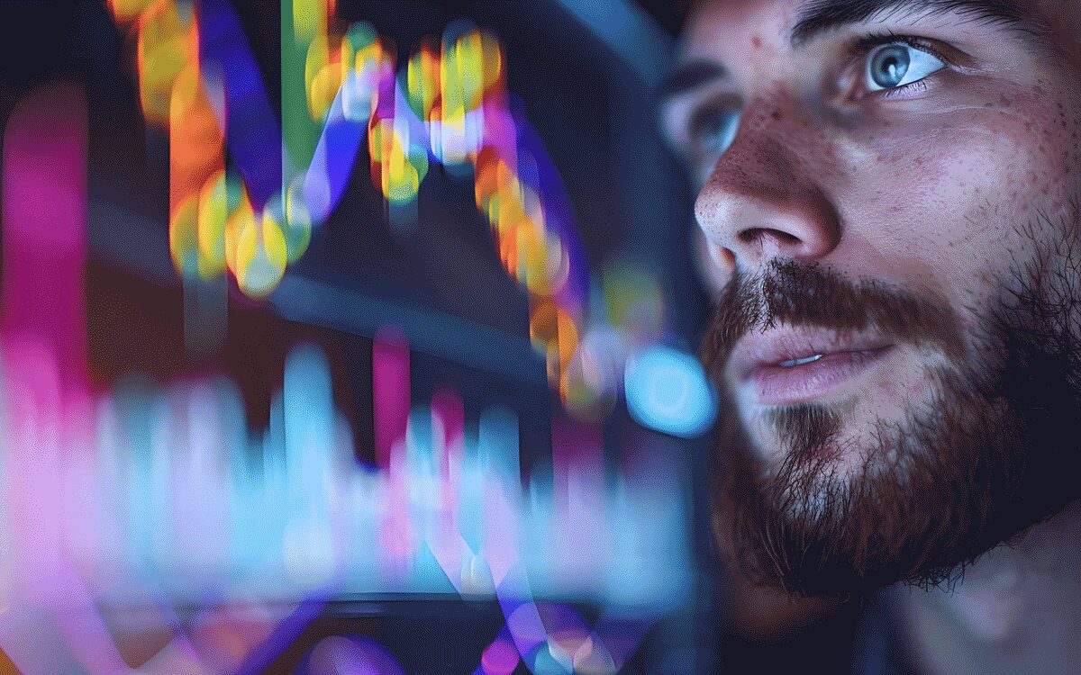 A man looking at a blurred crypto investment chart.