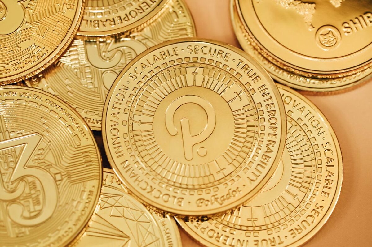 Stack of golden Polkadot coins.