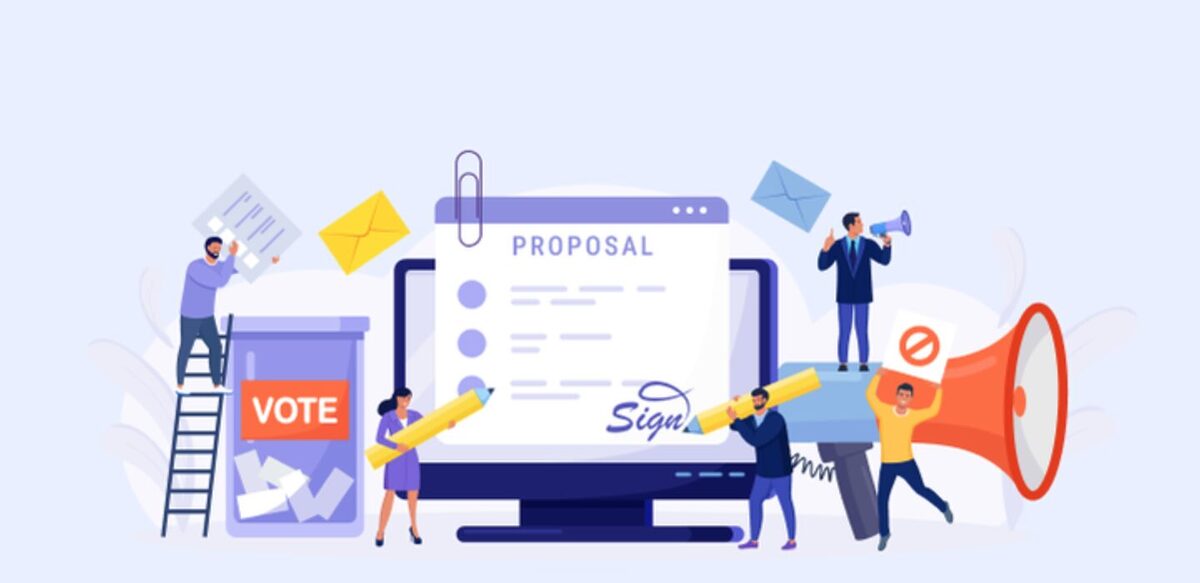 A group of small people running around to sign a proposal. On the left is a man piling a piece of paper into a VOTE box.