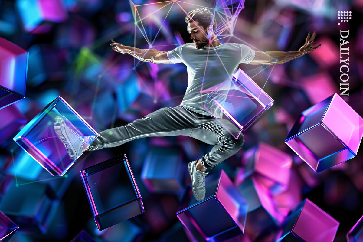 Man playing with blockchain cubes in the crypto space.