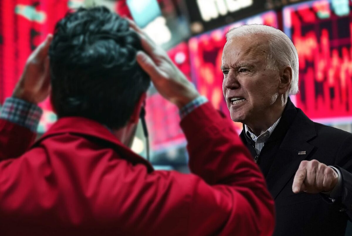 Joe Biden shouting at a worker who has his hands on his head.
