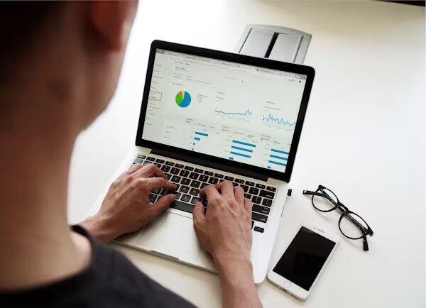 A human using computer to trade crypto.