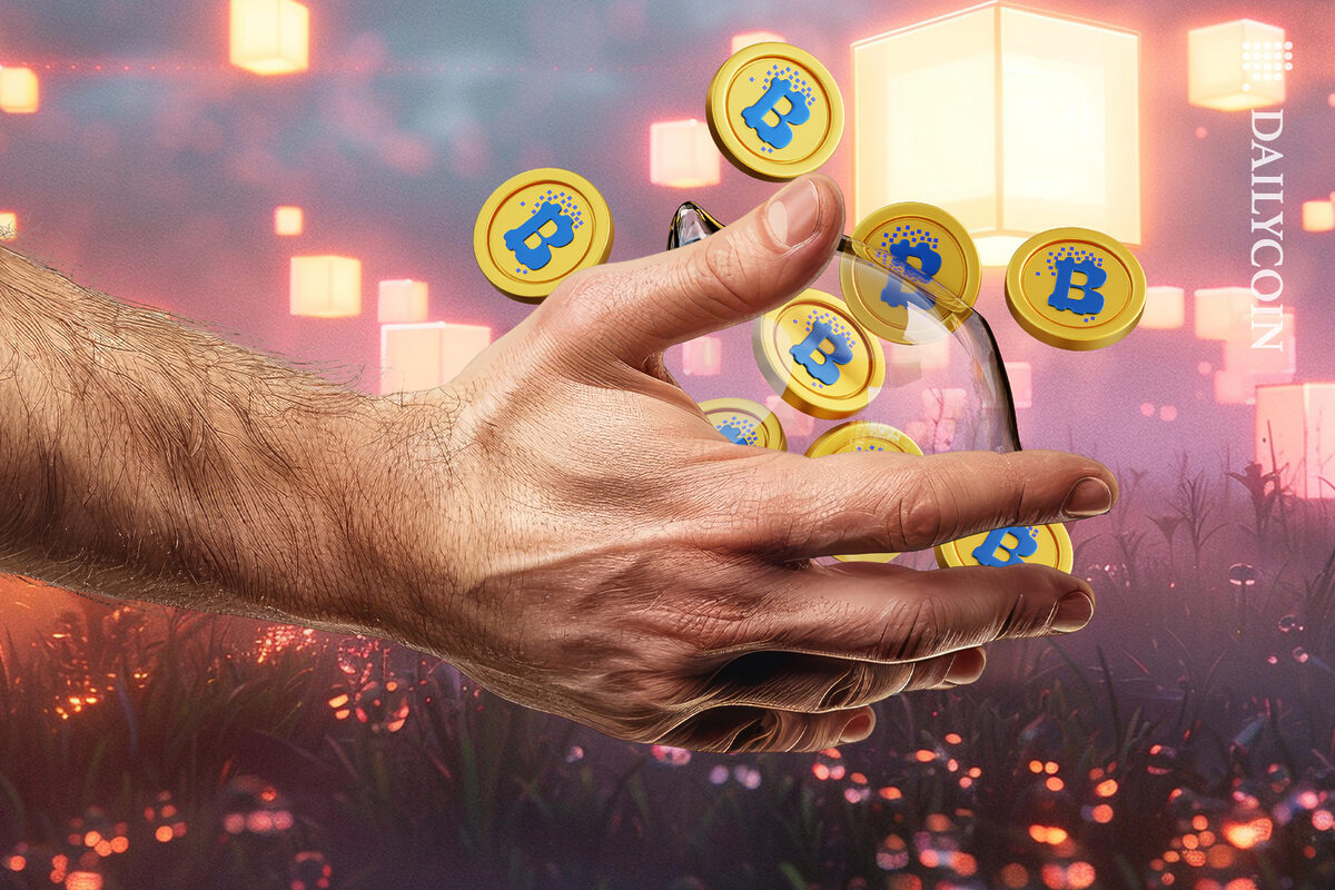 Hand holding a Ukrainian piggy bank reserve full of Bitcoin (BTC).