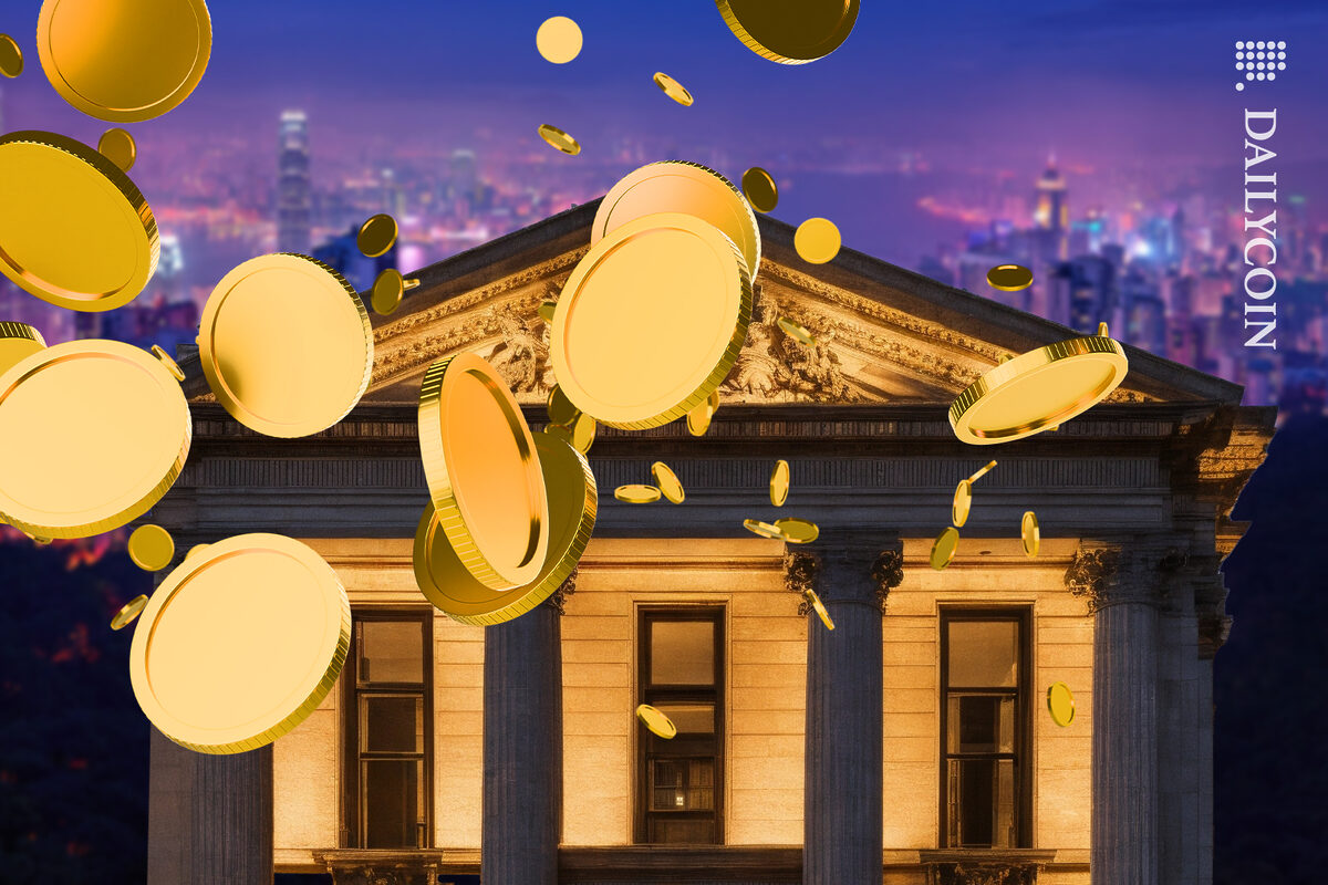 Coins going on top of a bank in Hong Kong.